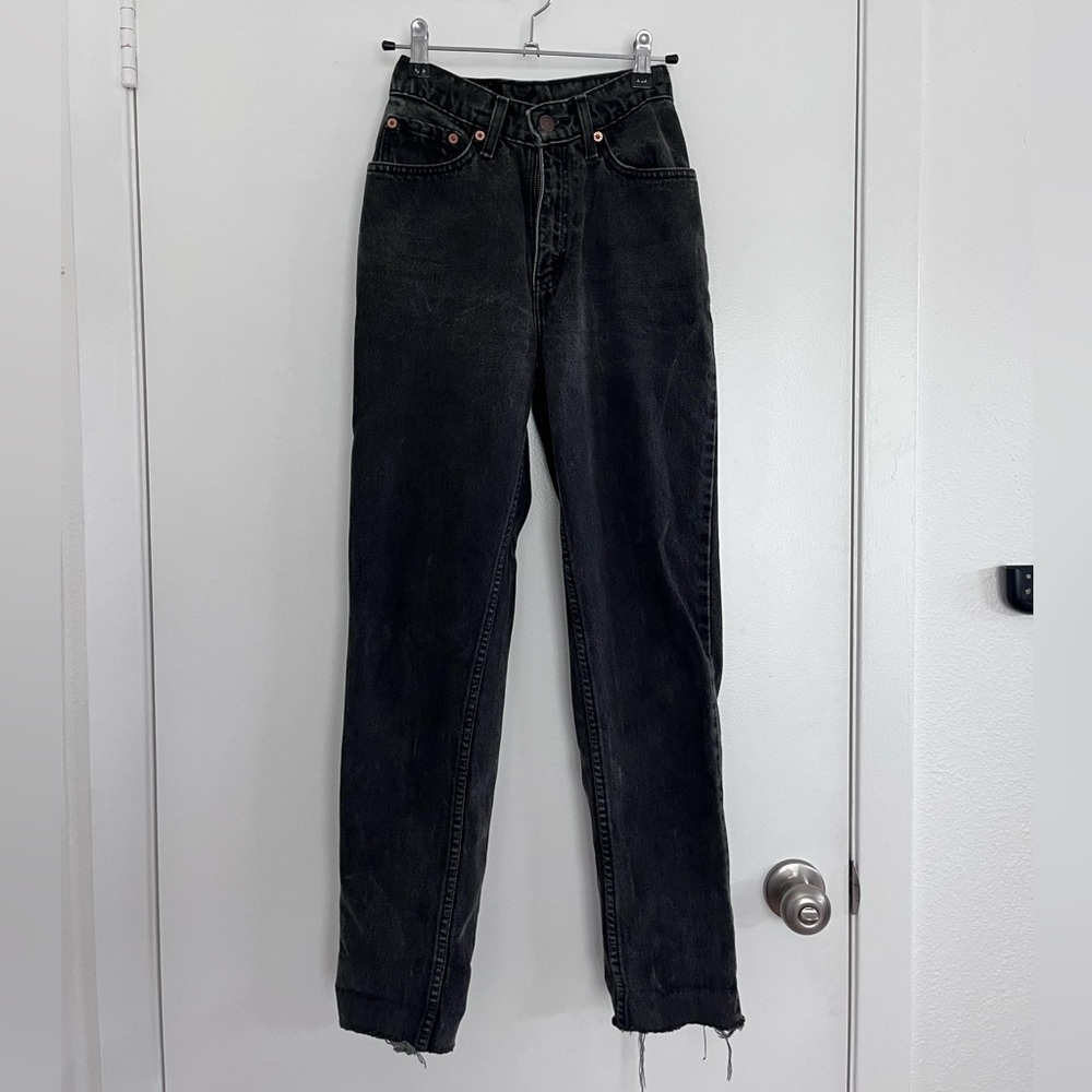 Vintage Levi black wash jeans and with raw hem